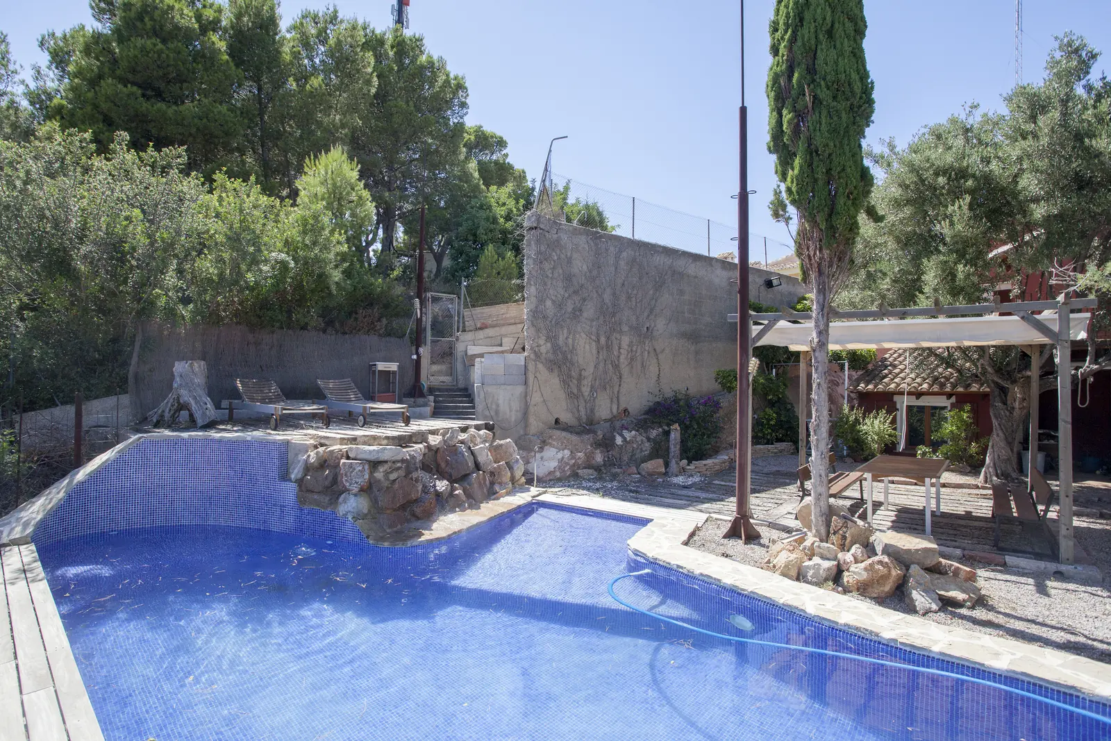 Piscina privada y porche de Ca Carmela en Náquera